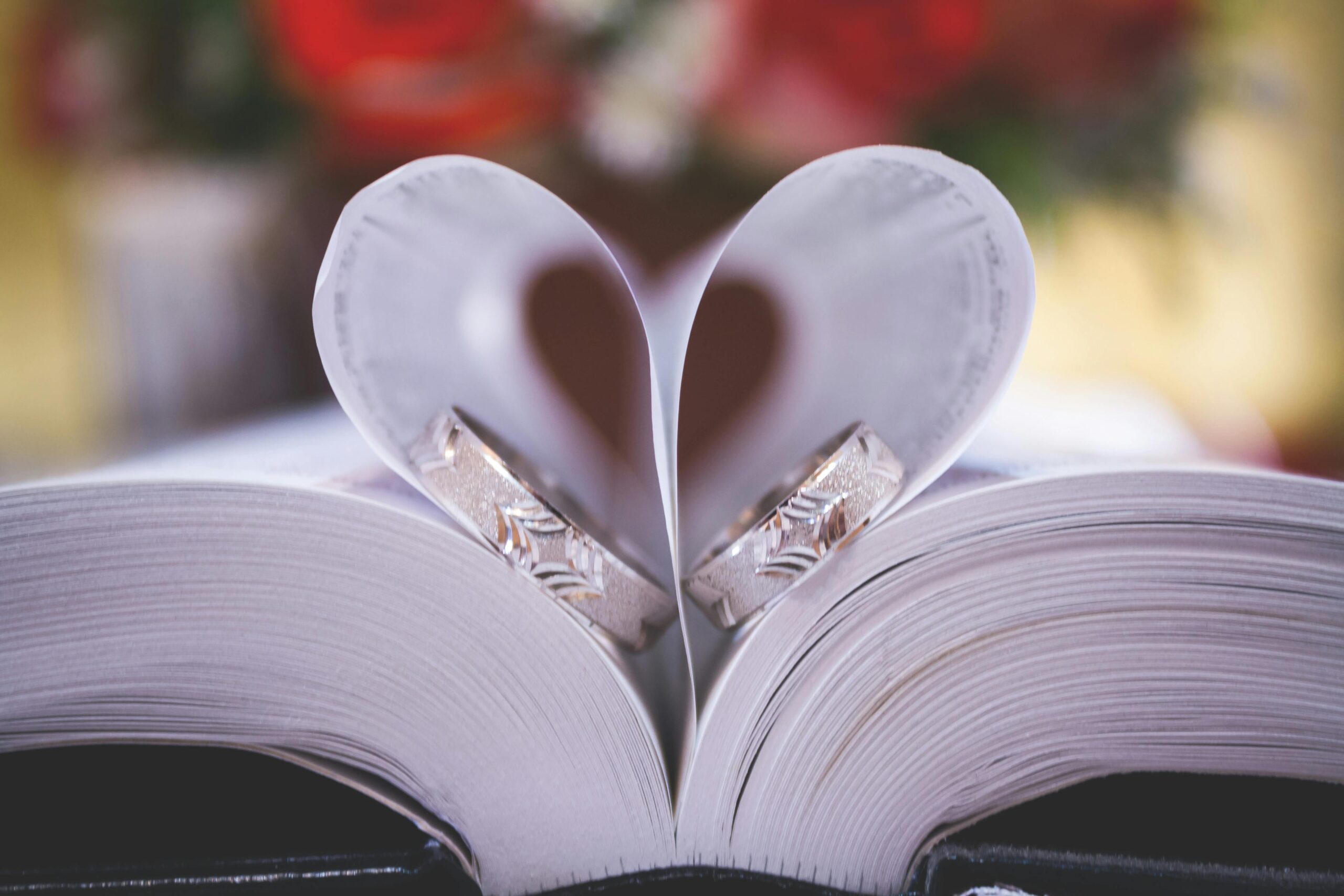 a book with pages made into a heart shape